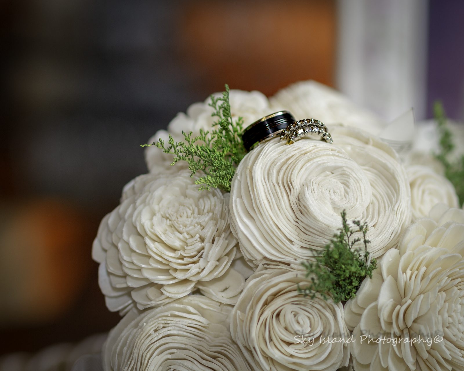 White wedding Bouquet with wedding rings Captured in Bethlehem Pa by John Heyward Sky Island Photography